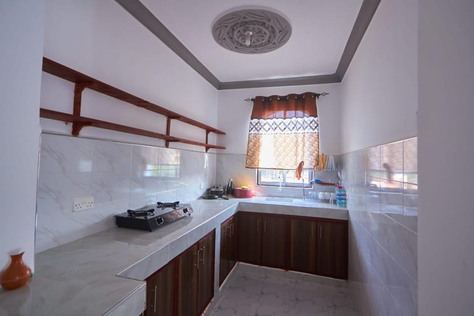 Kitchen or kitchenette, stove