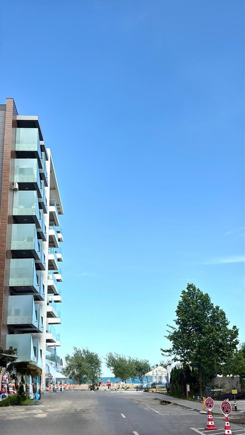 Property building, Day, Beach, Location