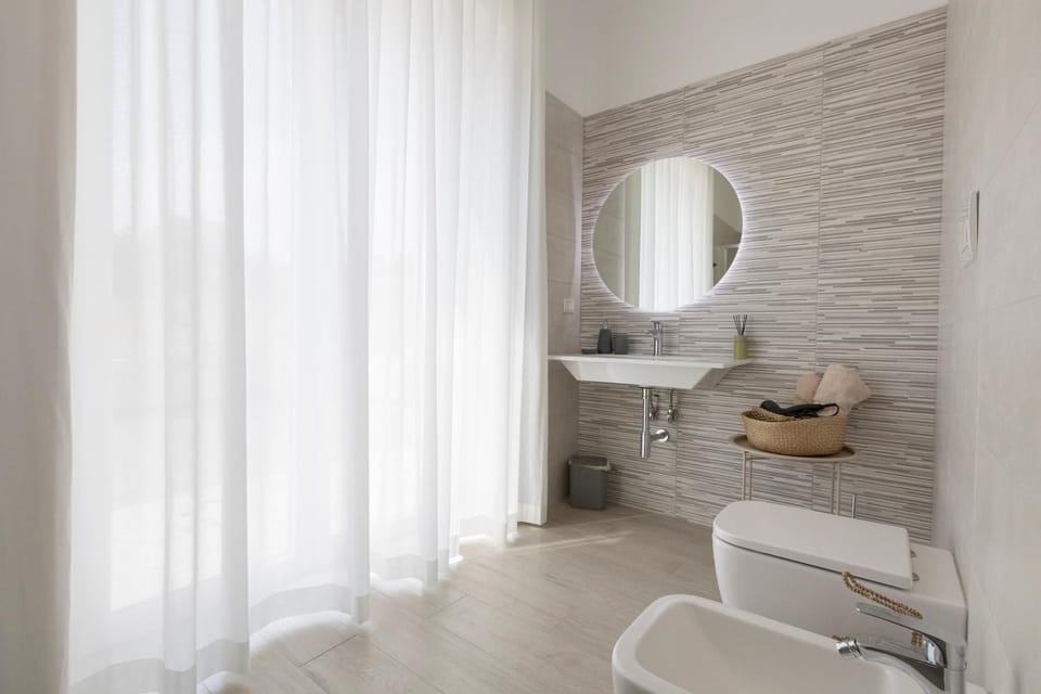 Toilet, Bathroom, hair dryier, towels