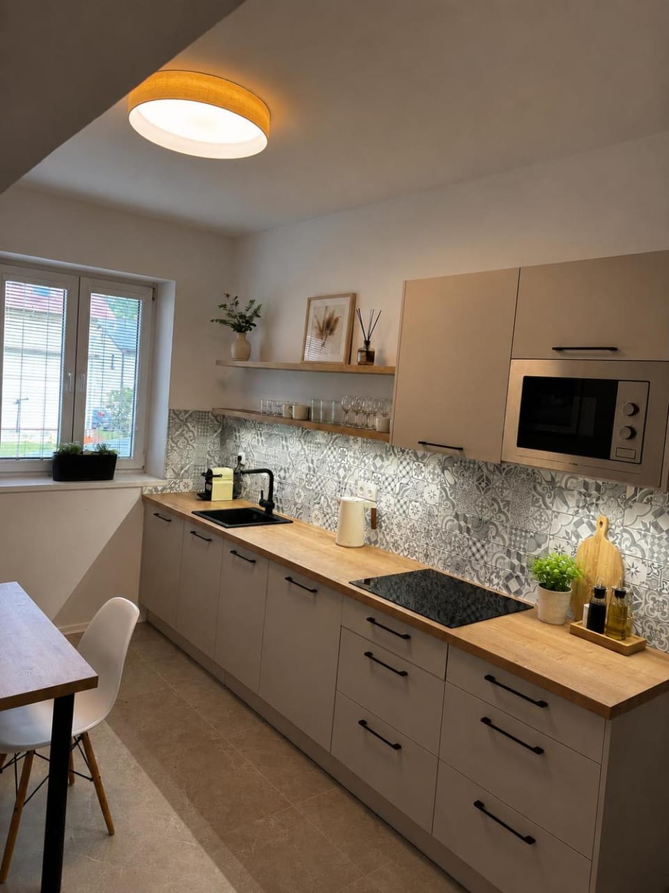 Kitchen or kitchenette, dishwasher, stove, washing machine