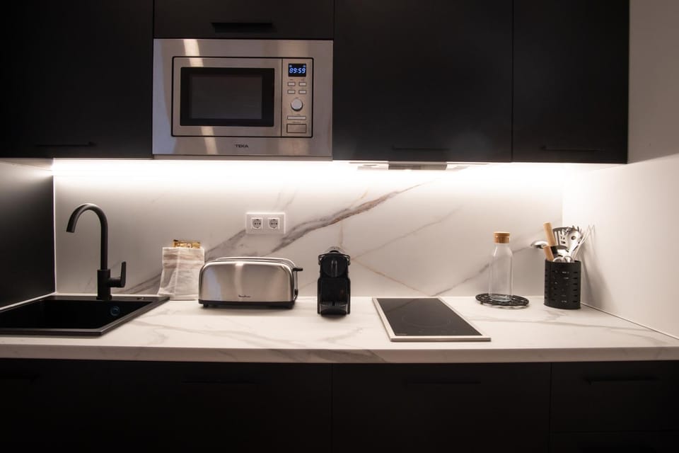 Kitchen or kitchenette, stove, toaster