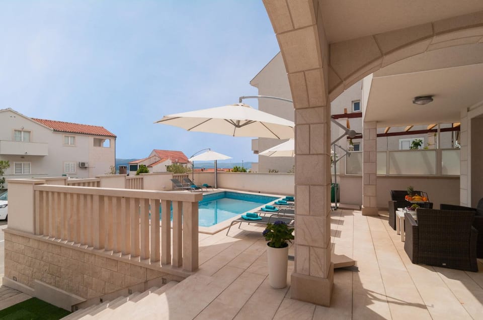 Facade/entrance, Balcony/Terrace, Pool view, Swimming pool