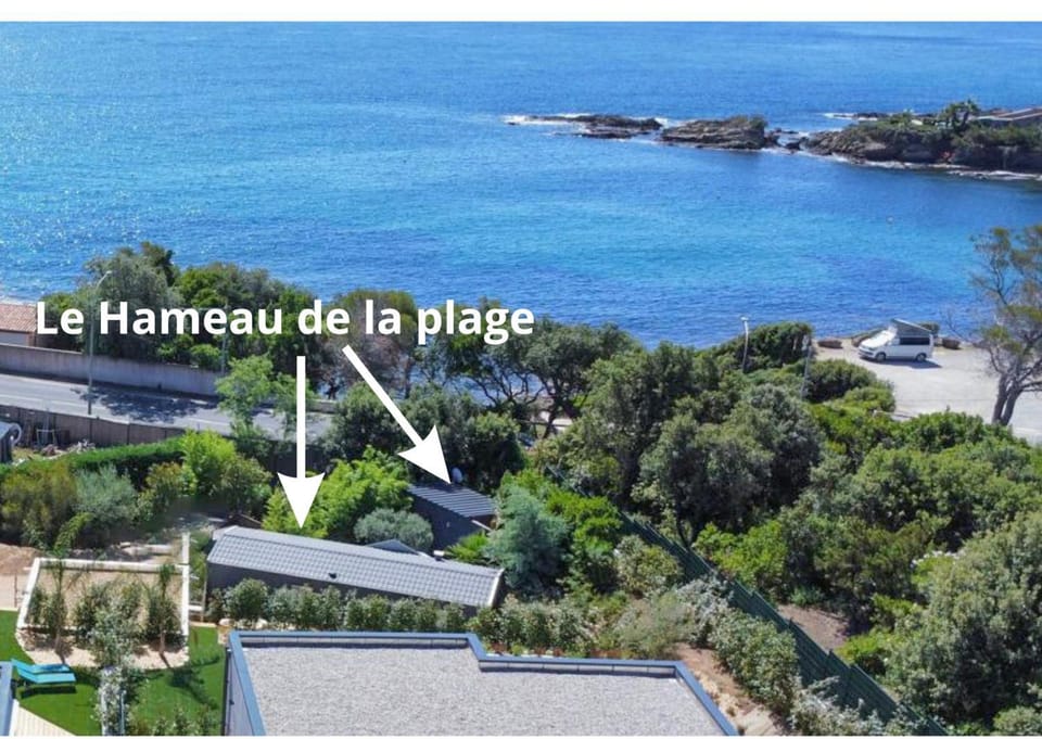 Property building, Nearby landmark, Day, Natural landscape, Beach, Sea view