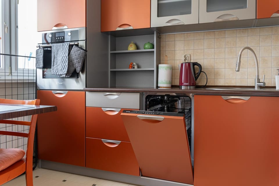 Kitchen or kitchenette, dishwasher, oven, stove