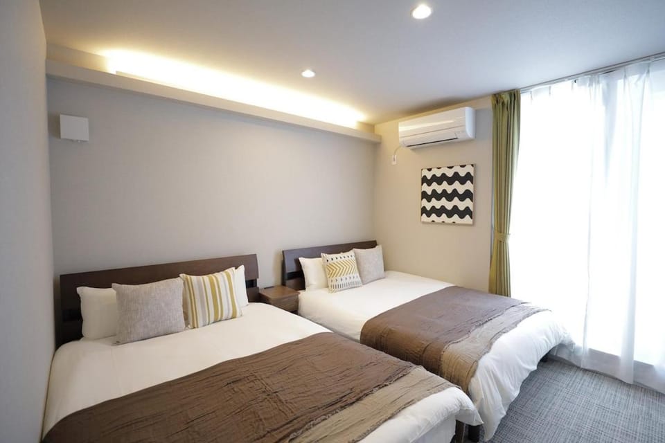 Koti Sopo Universal Bay 7 by Liaison Apartment in Osaka