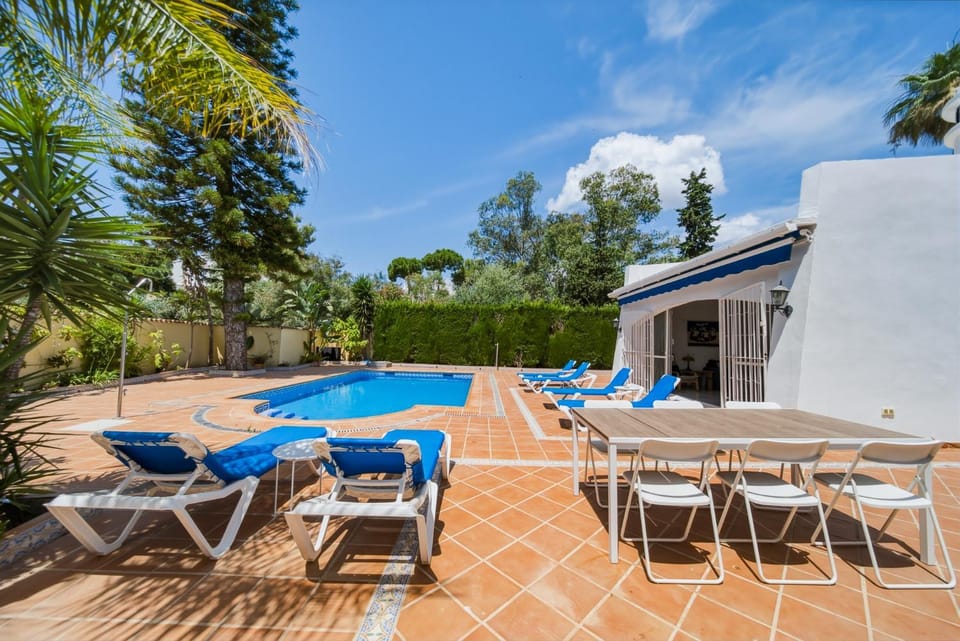 Property building, Patio, Swimming pool, sunbed