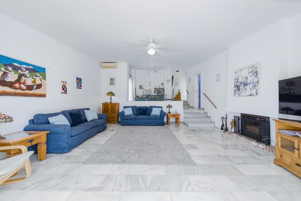 TV and multimedia, Living room, Seating area, fireplace, air conditioner