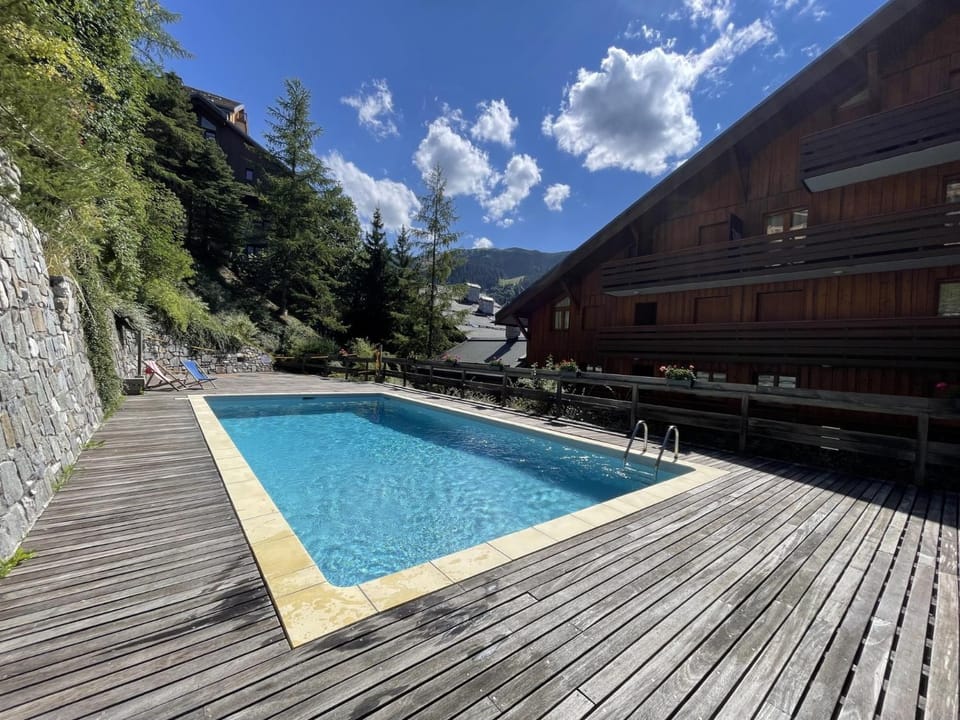Appartement de charme Meribel Centre et a 200m des pistes Apartment in Les Allues