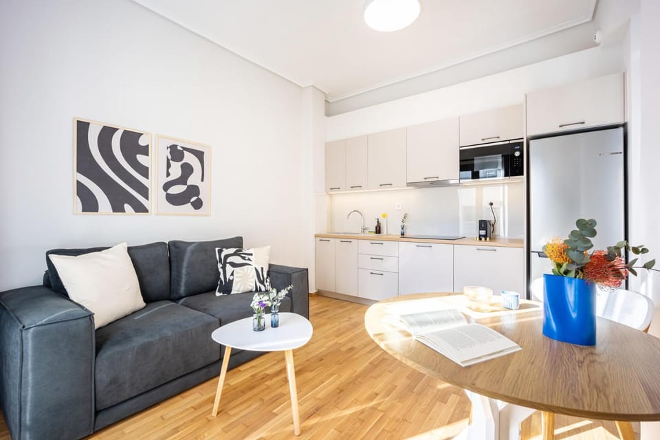 Kitchen or kitchenette, Living room, Seating area, Dining area