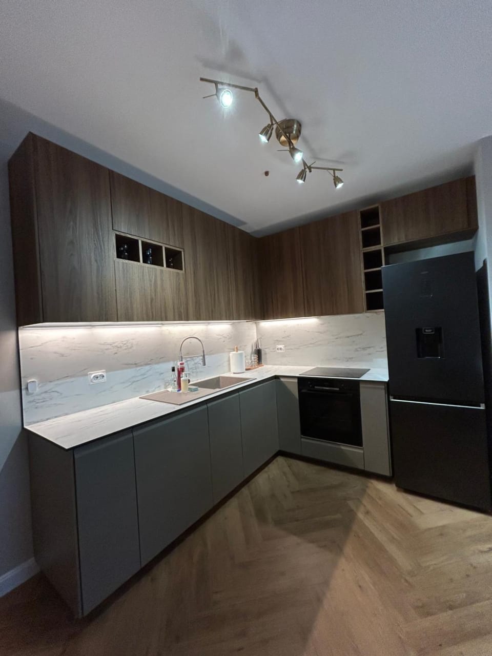 Kitchen or kitchenette, dishwasher, oven, stove