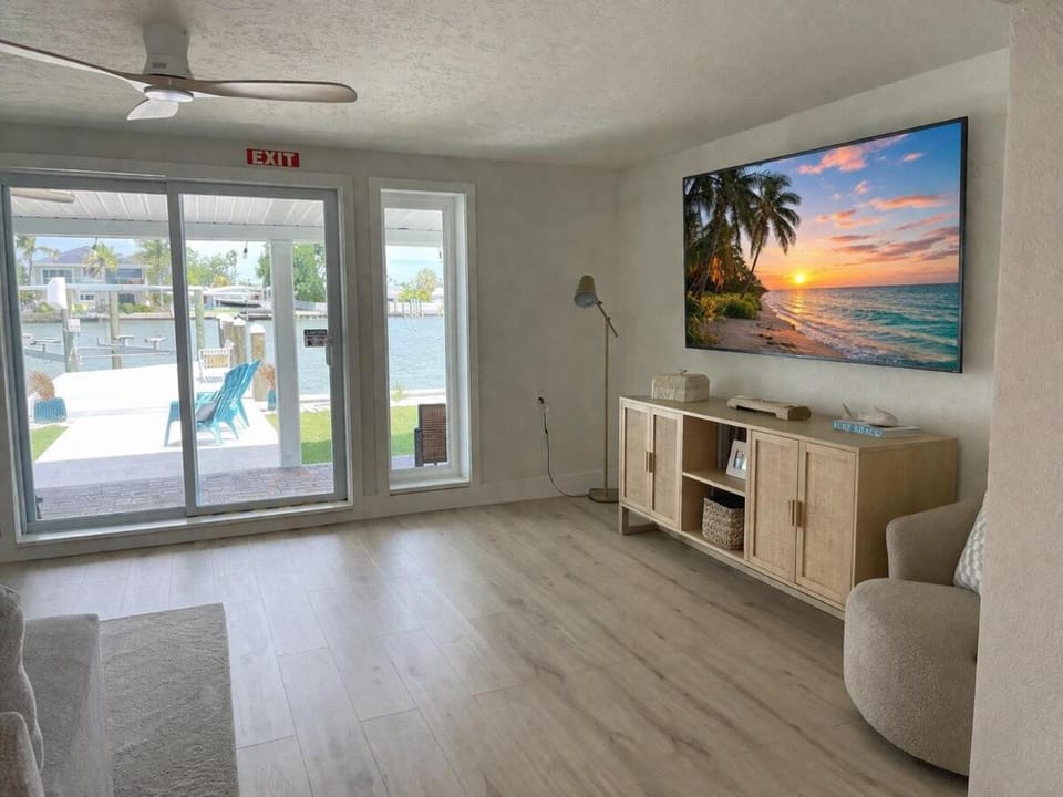 Waterfront Beach House with Golf Cart and Family Fun House in Indian Rocks Beach