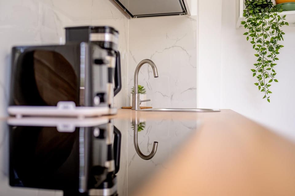 Kitchen or kitchenette, oven, stove
