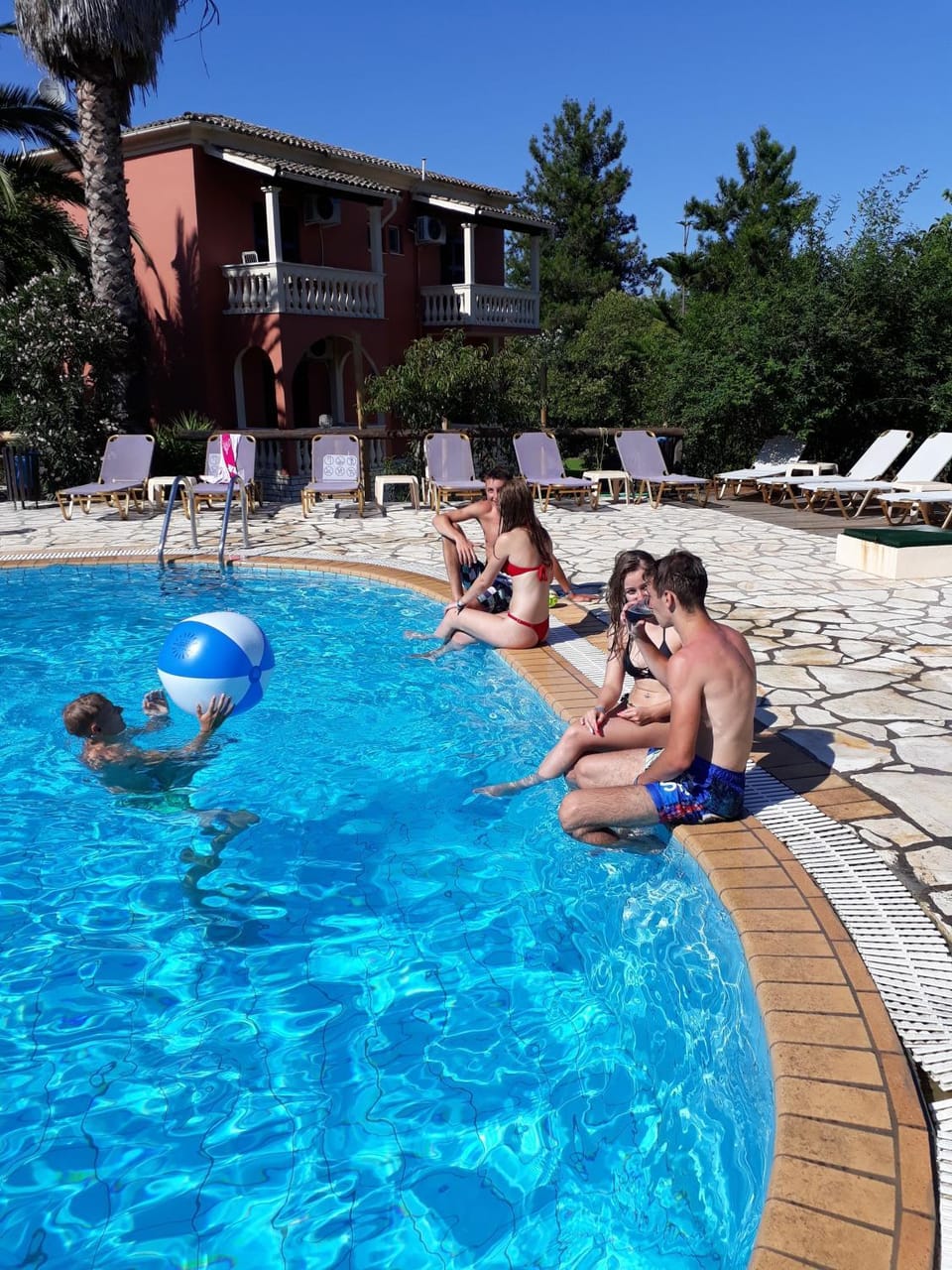 Property building, Living room, Swimming pool