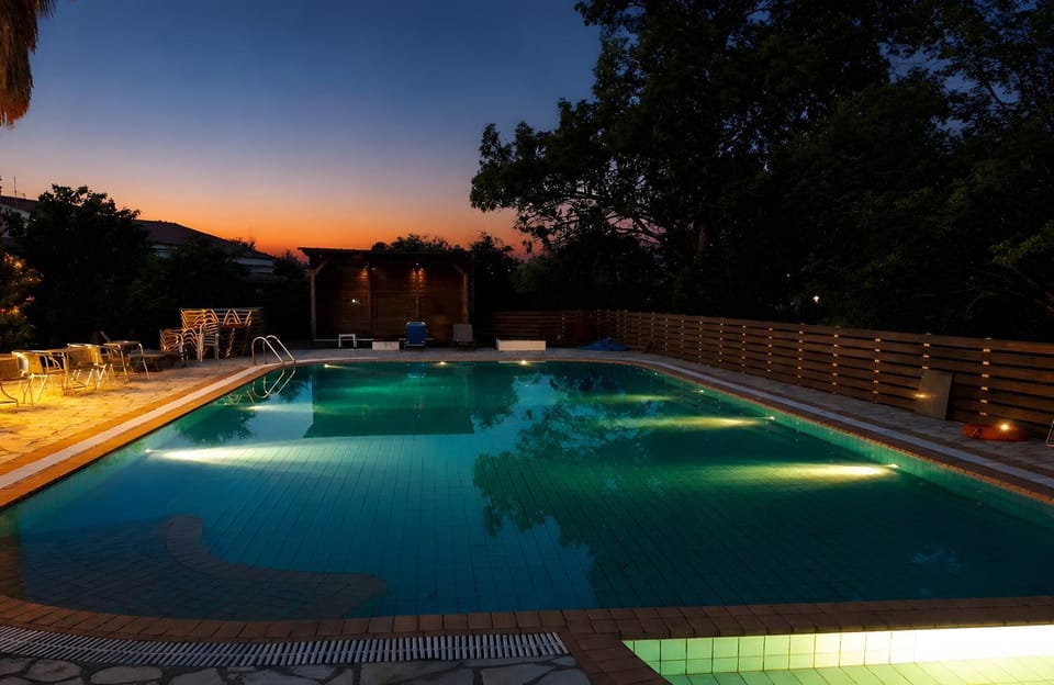 Property building, Living room, Swimming pool