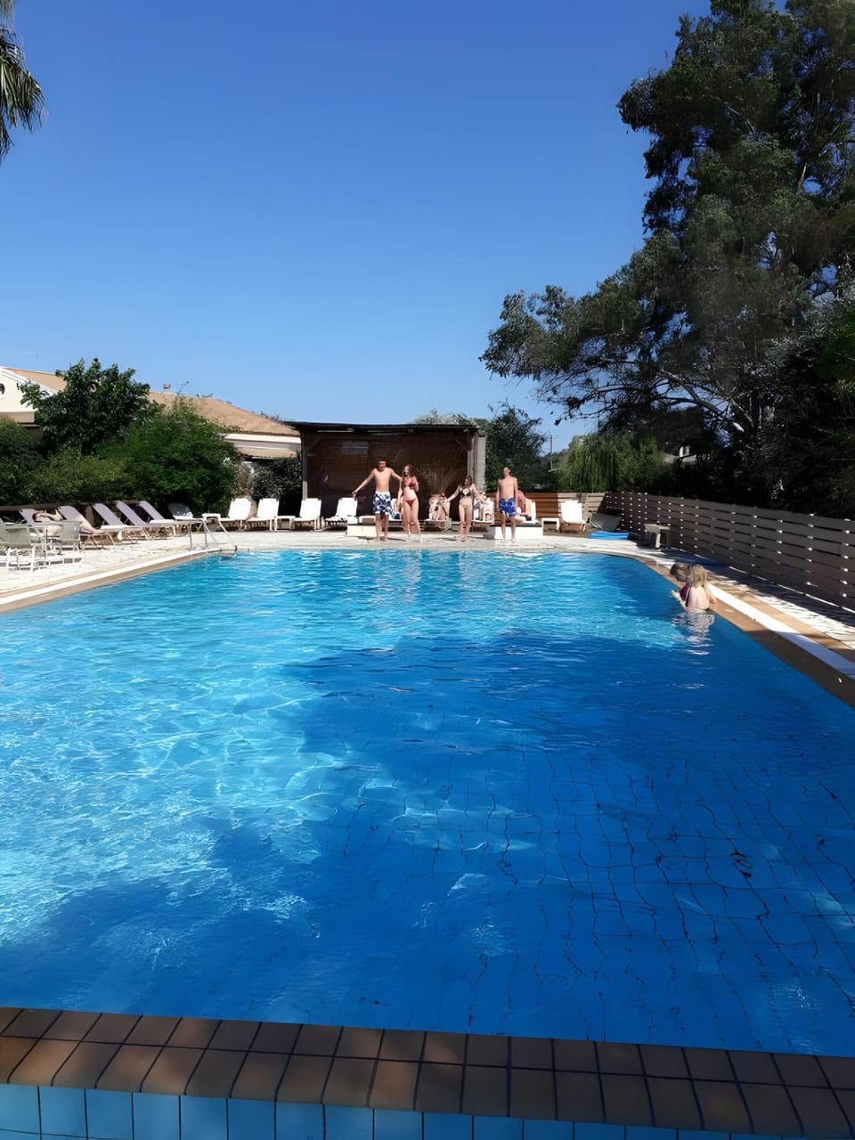 Property building, Living room, Swimming pool