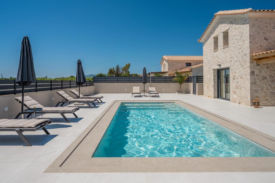 Patio, Day, Natural landscape, Pool view, Swimming pool, sunbed