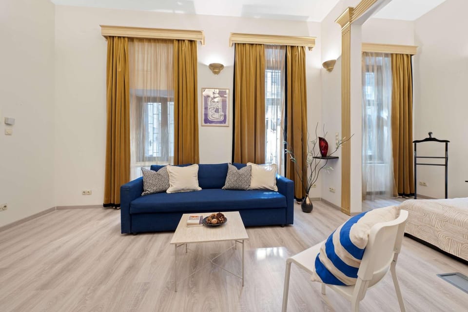 Bed, Living room, Seating area, Bedroom