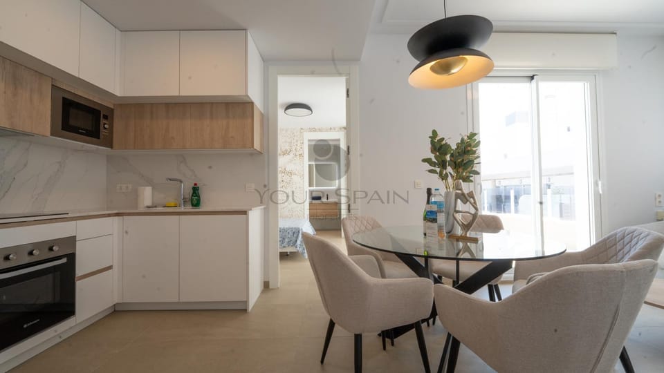 Dining area, microwave, stove, kitchen