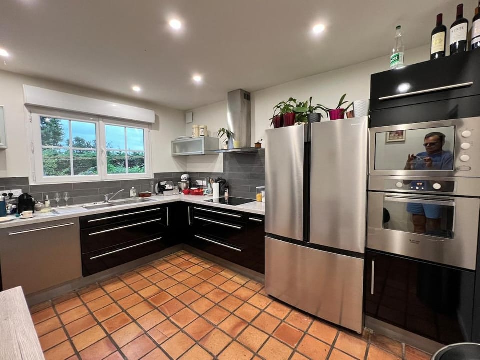 Kitchen or kitchenette, dishwasher, oven, stove