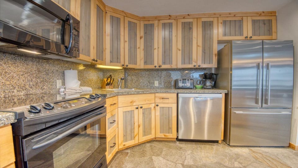 Kitchen or kitchenette, microwave, stove, kitchen