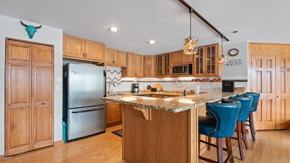 Day, Kitchen or kitchenette, Seating area, fireplace, furniture, microwave, oven, stove, kitchen, air conditioner