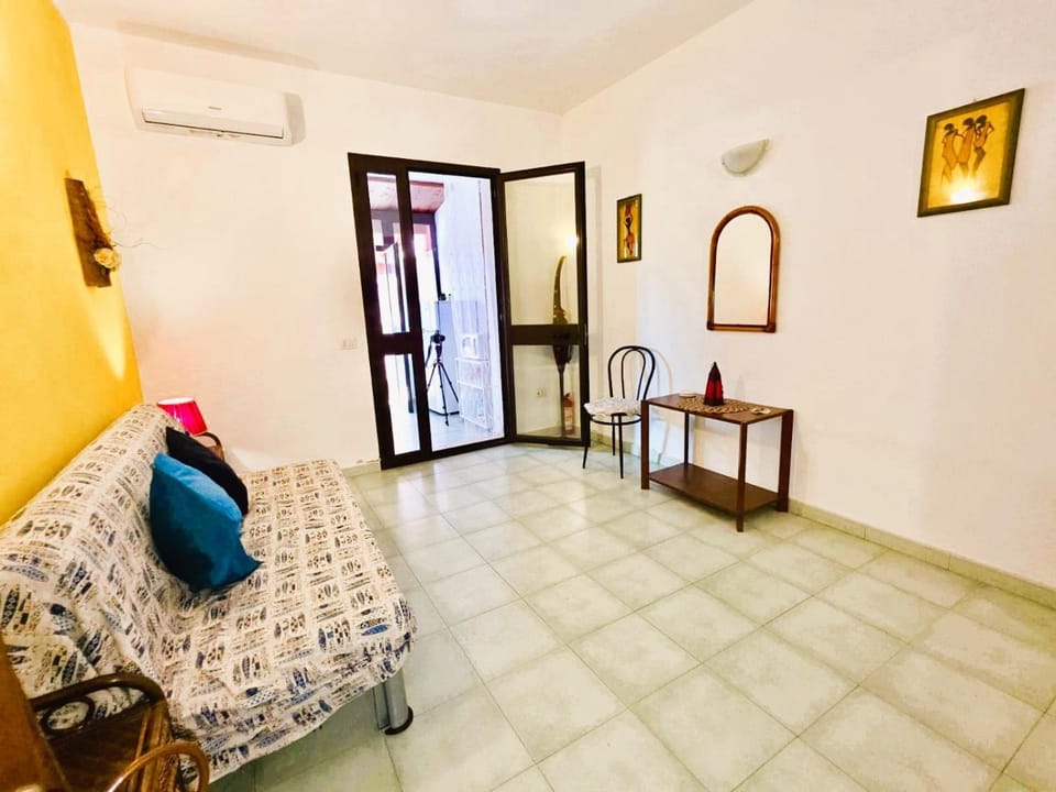 Bed, Living room, Seating area, Bedroom, air conditioner