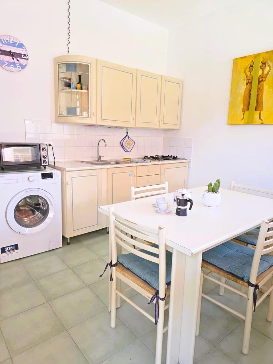 Dining area, microwave, oven, stove, washing machine, kitchen
