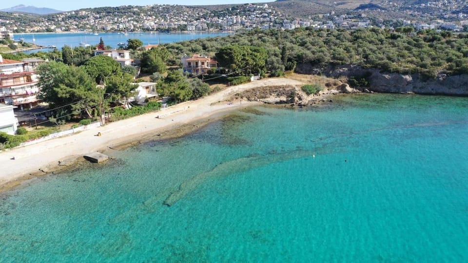 Beachfront Apt The sand will be under your feet Apartment in East Attica Regional Unit, Greece