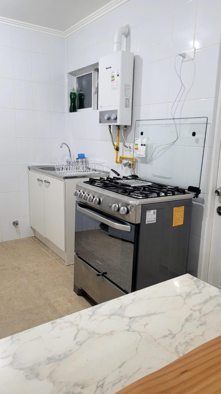 Kitchen or kitchenette, oven