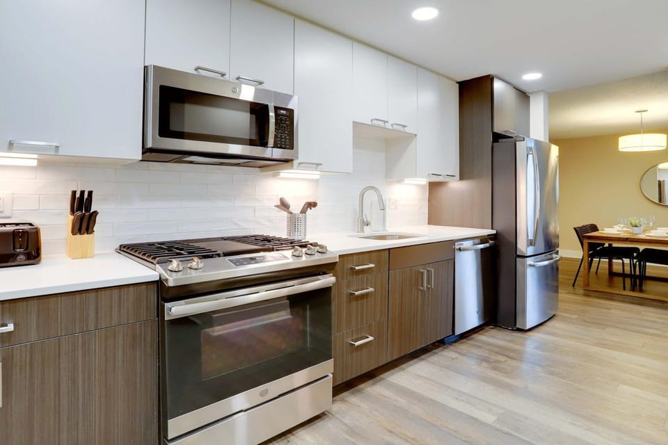 Kitchen or kitchenette, dishwasher, oven, stove, toaster