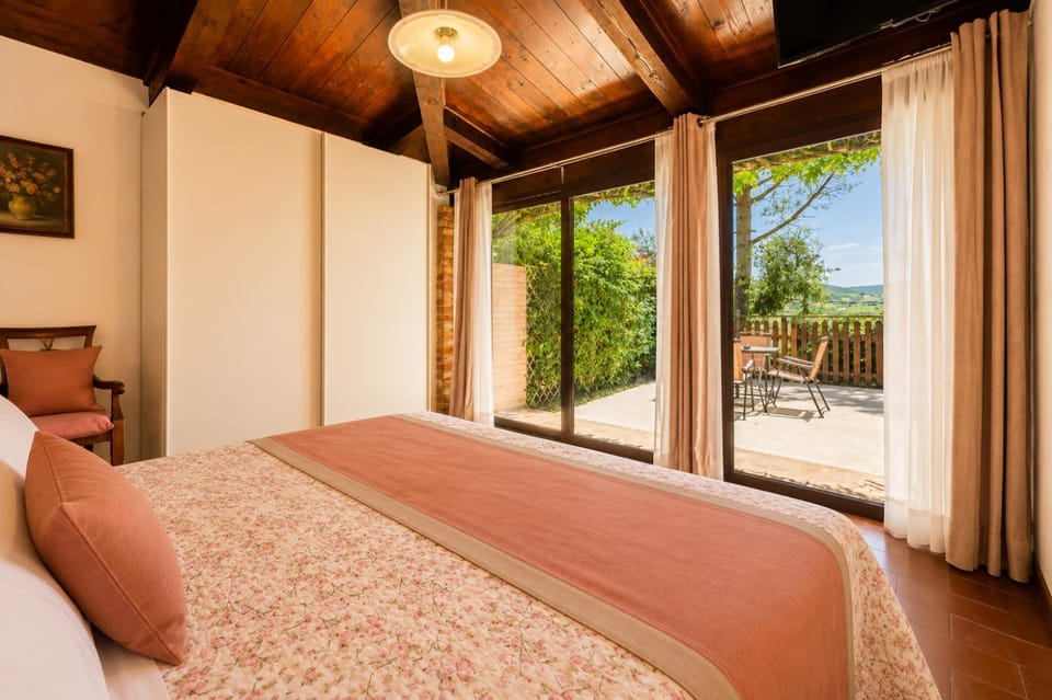 Patio, Bed, TV and multimedia, View (from property/room), Photo of the whole room, Decorative detail, Bedroom, Garden view, furniture, wardrobe
