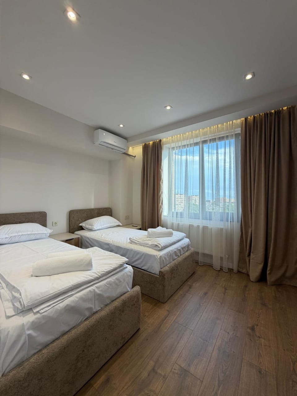 Bed, Photo of the whole room, Bedroom, towels, air conditioner