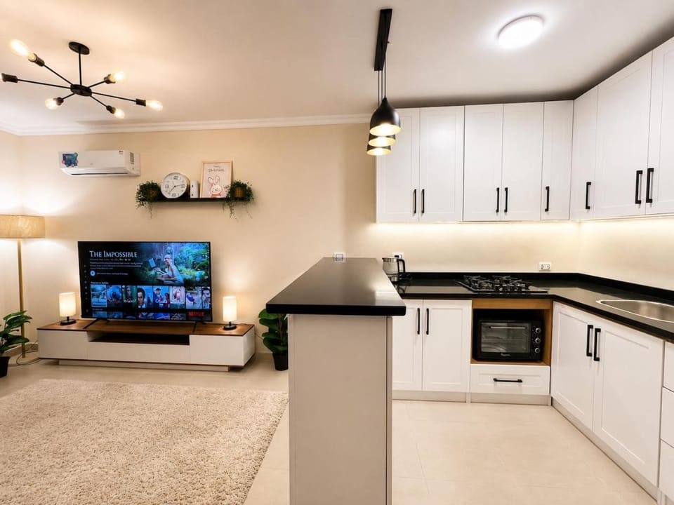 Kitchen or kitchenette, oven, stove