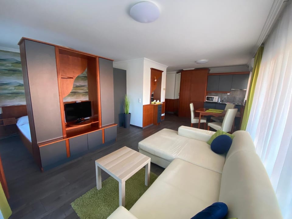 Communal lounge/ TV room, TV and multimedia, Living room, Photo of the whole room, Seating area, wardrobe