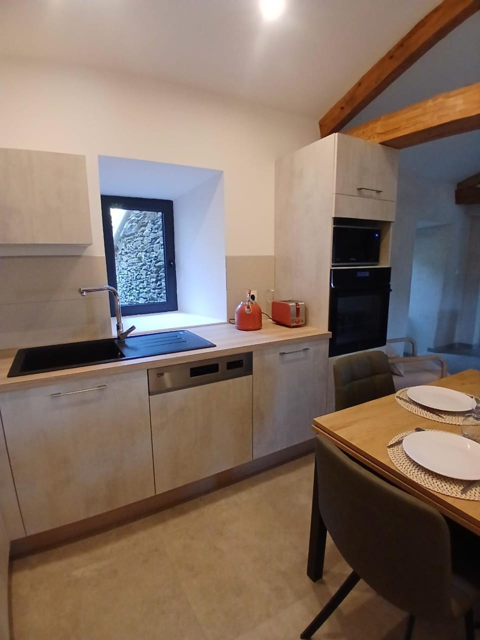 Dining area, dishwasher, oven, stove