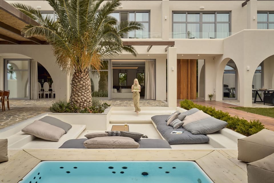 Property building, People, Natural landscape, Seating area, Swimming pool