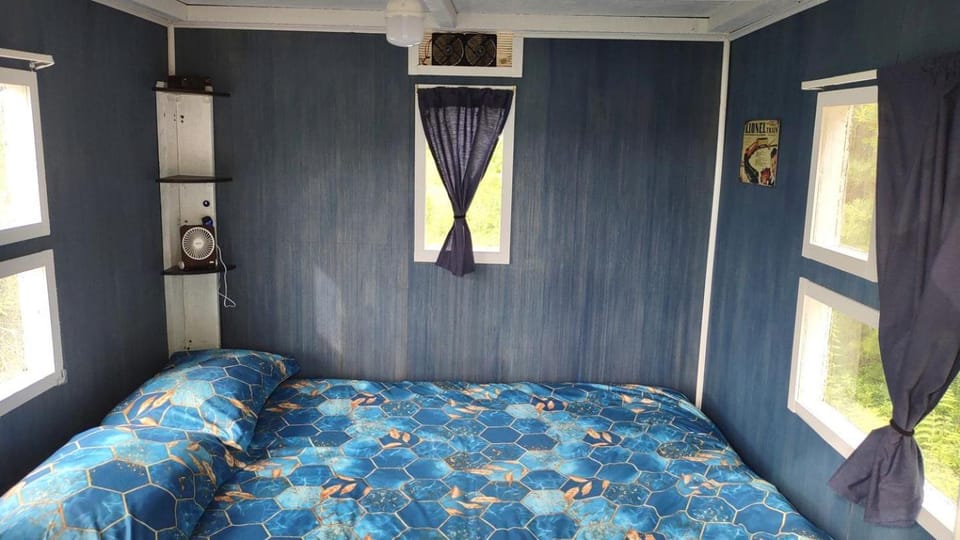 Whimsical Caboose Glamping Cabin with SpookyWoods Trail Near Penobscot River | Lincoln, Maine Cabin in Lincoln