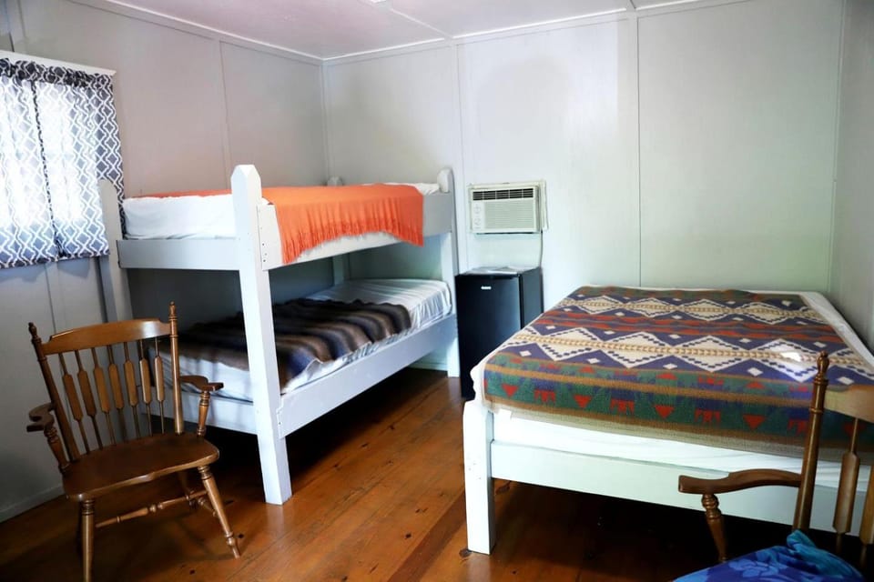 Camper Cabin Escape with Fire Pit and Covered Porch in Branson, Missouri Cabin in Sunset Cove Township