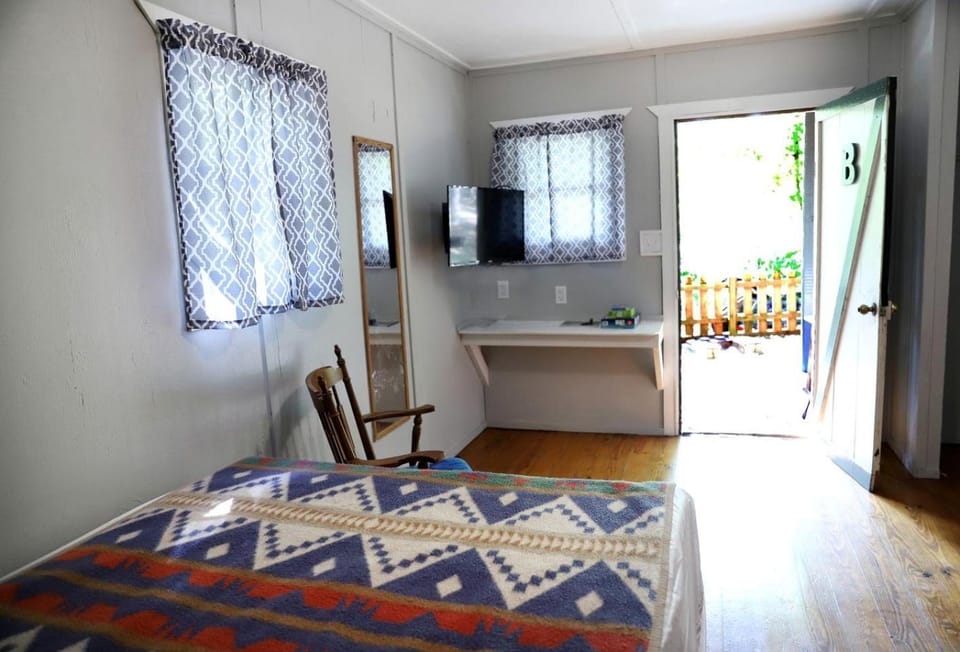 Camper Cabin Escape with Fire Pit and Covered Porch in Branson, Missouri Cabin in Sunset Cove Township