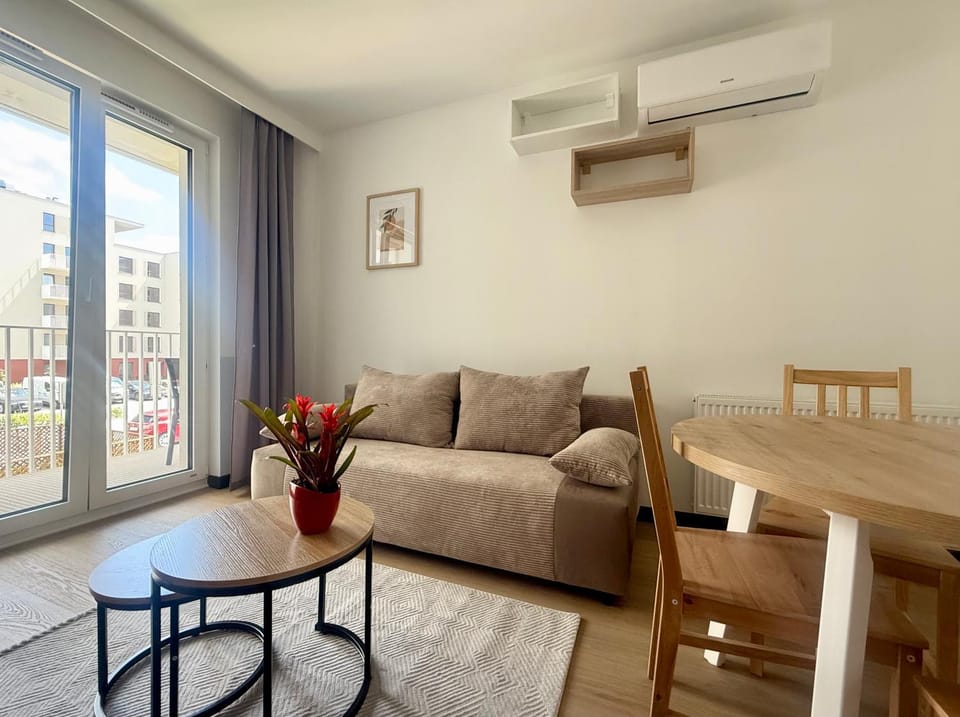 View (from property/room), Living room, Seating area, Dining area, air conditioner