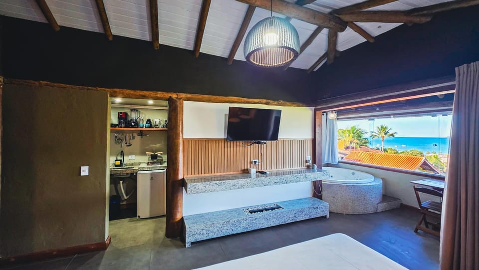 Studio Moderno com Vista pro mar com hidromassagem e churrasqueira privativas e Piscina aquecida na área comum Apartment in São Sebastião