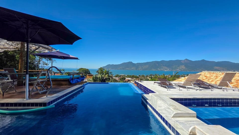 Studio Moderno com Vista pro mar com hidromassagem e churrasqueira privativas e Piscina aquecida na área comum Apartment in São Sebastião