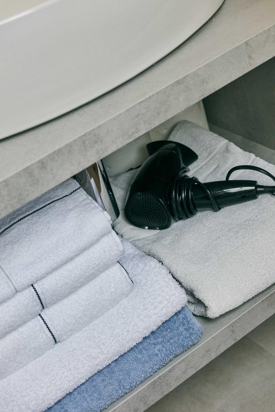 Bathroom, hair dryier, towels