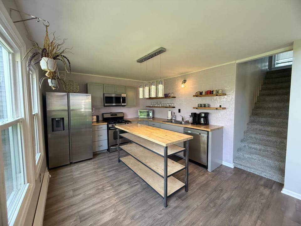 Kitchen or kitchenette, dishwasher, oven, stove, toaster