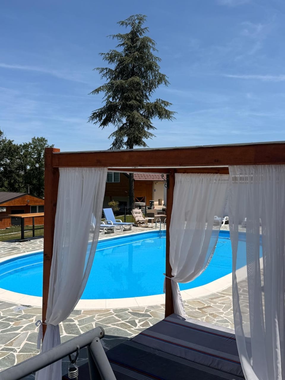 Patio, Day, Pool view, Swimming pool, sunbed