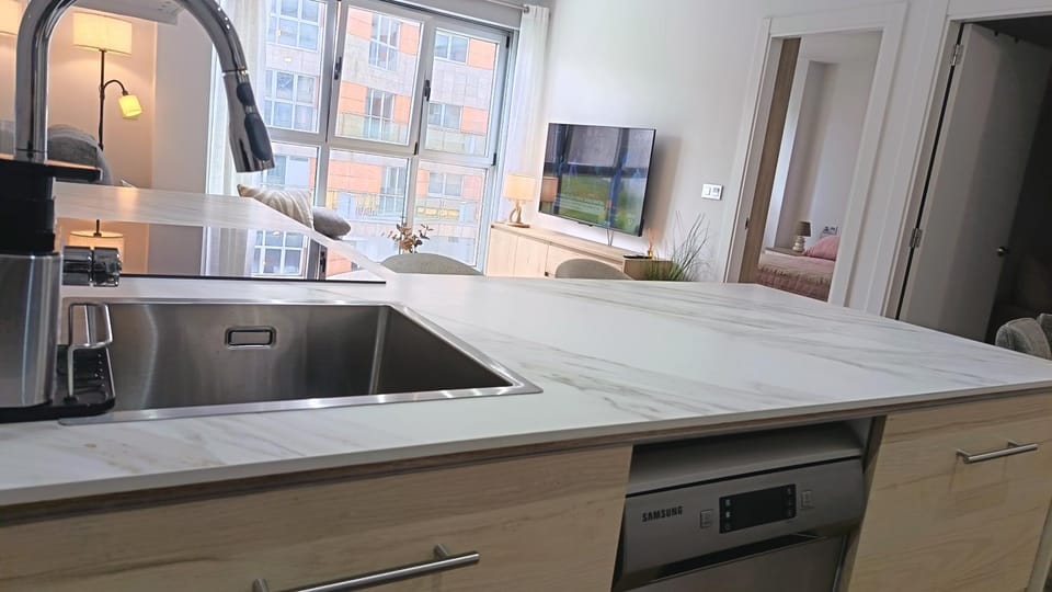 Kitchen or kitchenette, dishwasher, stove