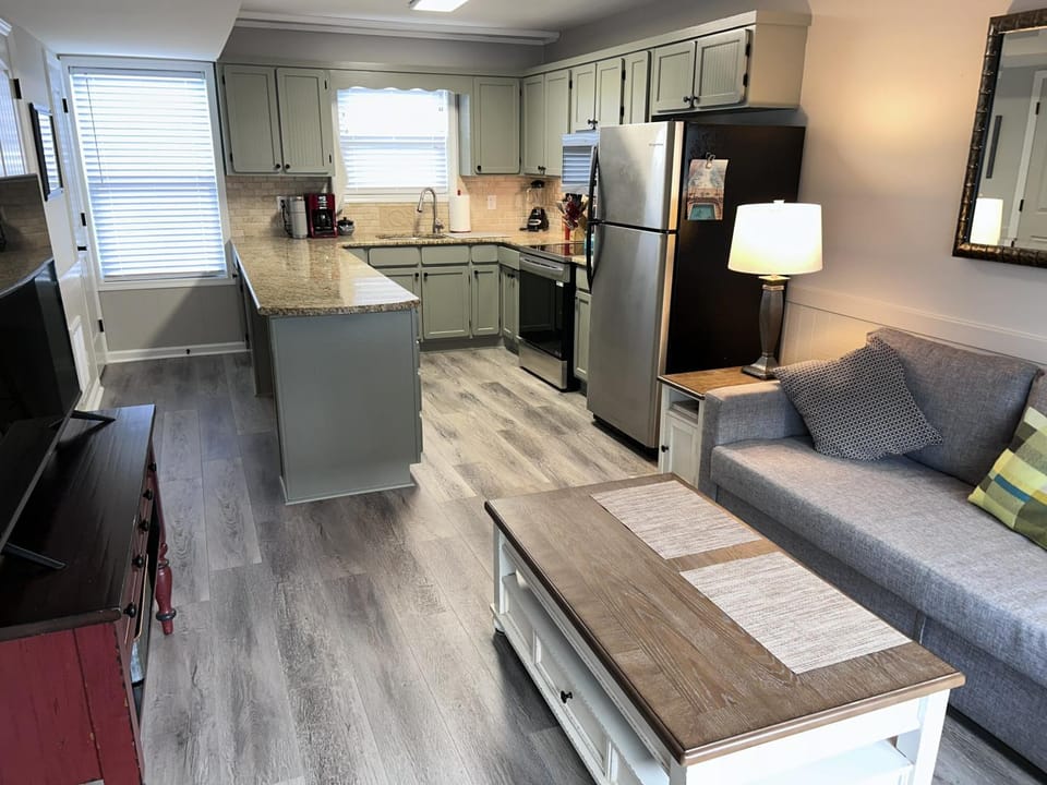 Kitchen or kitchenette, Living room, Dining area, dishwasher, oven, stove