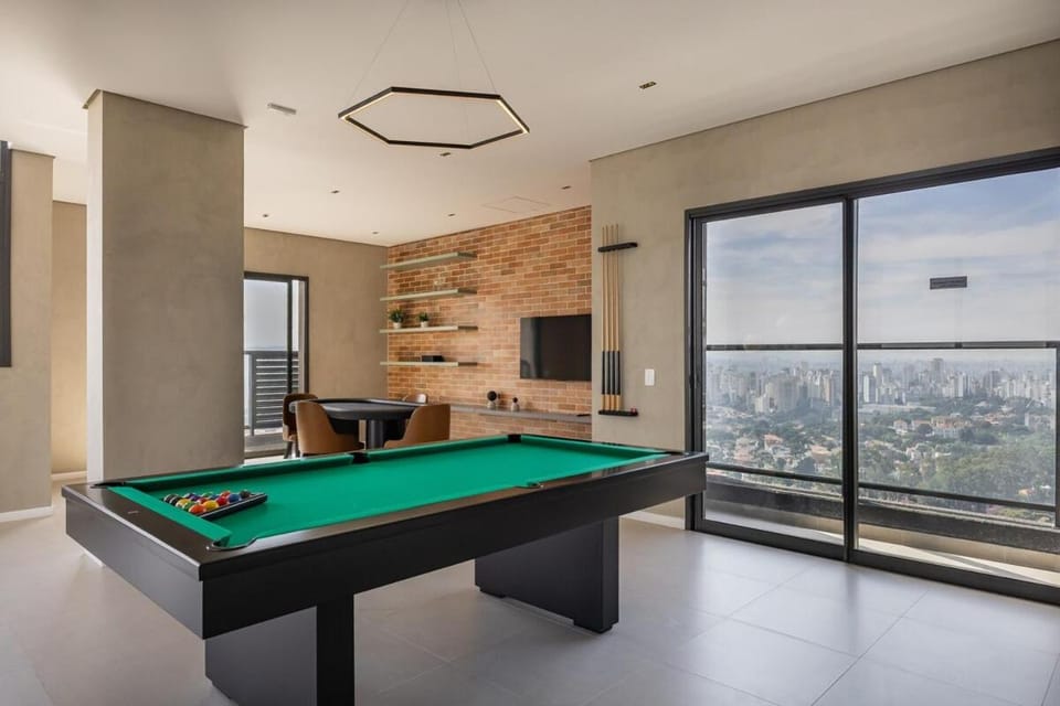 Stay Home Pinheiros - Apartamento completo com Varanda - Piscina interna e Piscina externa - Academia top - Sala de jogos com Bilhar - Lavanderia - Sala Coworking Apartment in Sao Paulo City