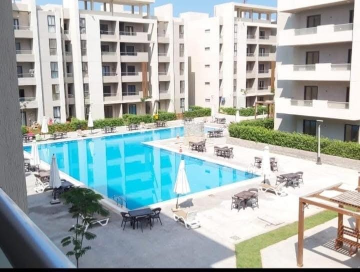 Property building, Day, View (from property/room), Pool view, Swimming pool