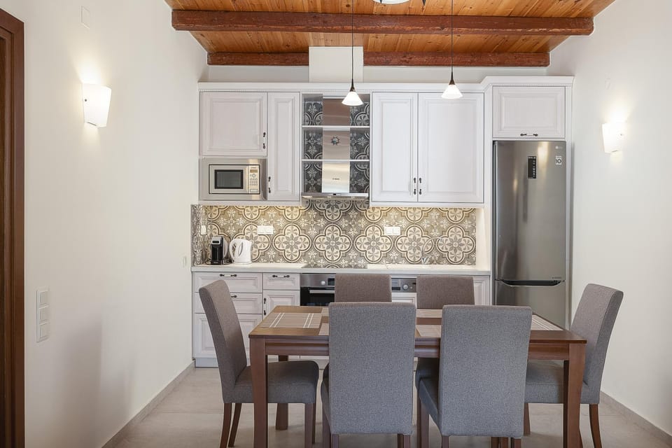 Kitchen or kitchenette, Dining area, dishwasher, microwave, oven, stove, toaster